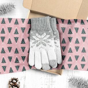 Grüne Weihnachtsbäume auf rosa Wirbel Seidenpapier