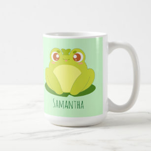Grüner Frosch auf der Blätter Kaffeetasse