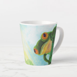 Grüner Frosch, der Rochen fängt Milchtasse
