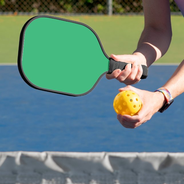 grüner Hintergrund mit weißem Rand Pickleball Schläger (InSitu)