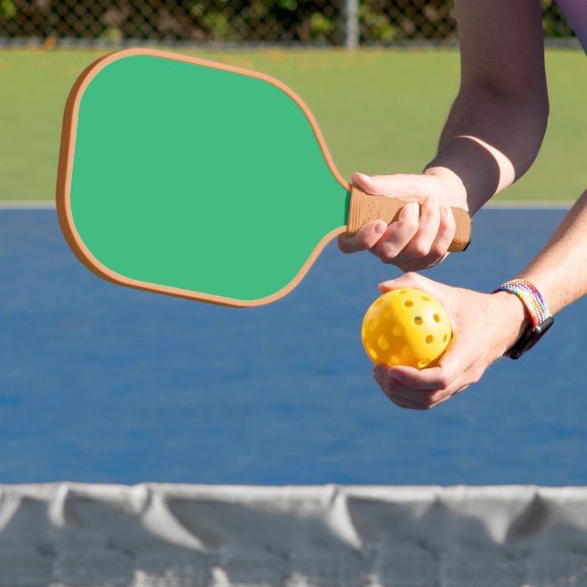 grüner Hintergrund mit weißem Rand Pickleball Schläger (InSitu)