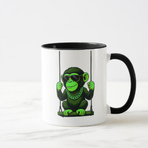Grüner Kartoonaffe auf einer Schaukel. Tasse