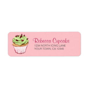 Grüner kleiner Kuchen auf rosa