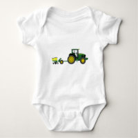Grüner Traktor mit Pflanzer-Wagen
