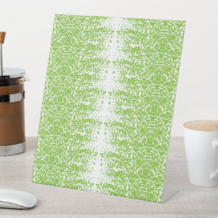 grüner und weißer Hintergrund mit kleinen Punkten Sockelschild