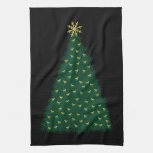 Grüner Weihnachtsbaum, goldene Laufpferde auf schw Handtuch