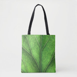 Grünes Blatt auf einem Marktosack Tasche