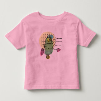 Grünes Häschen, das den T - Shirt des