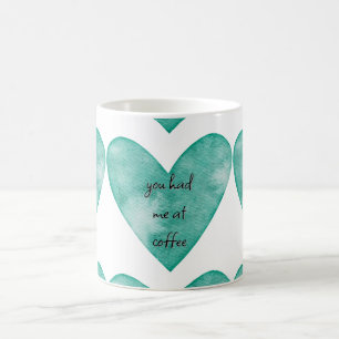 Grünes Herz, dass du mich in der Tasse des Kaffees