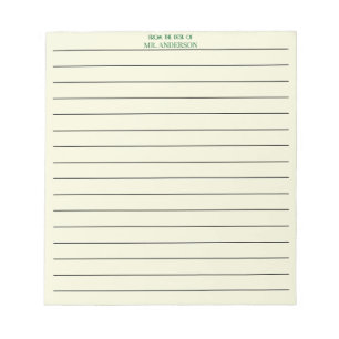 Grünes, liniertes Lehrerpapier von dem Schreibtisc Notizblock