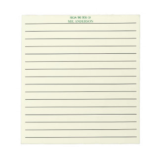 Grünes, liniertes Lehrerpapier von dem Schreibtisc Notizblock