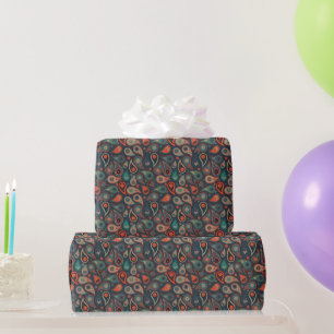 grünes orangefarbenes Paisley-Muster auf dunkelbla Geschenkpapier