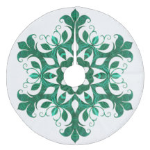 Grünes Schneeflocken-Blume-Muster auf Weiß
