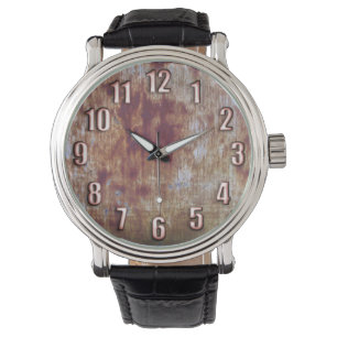Grunge rostes Metall mit großen Bronzenzahlen beob Armbanduhr