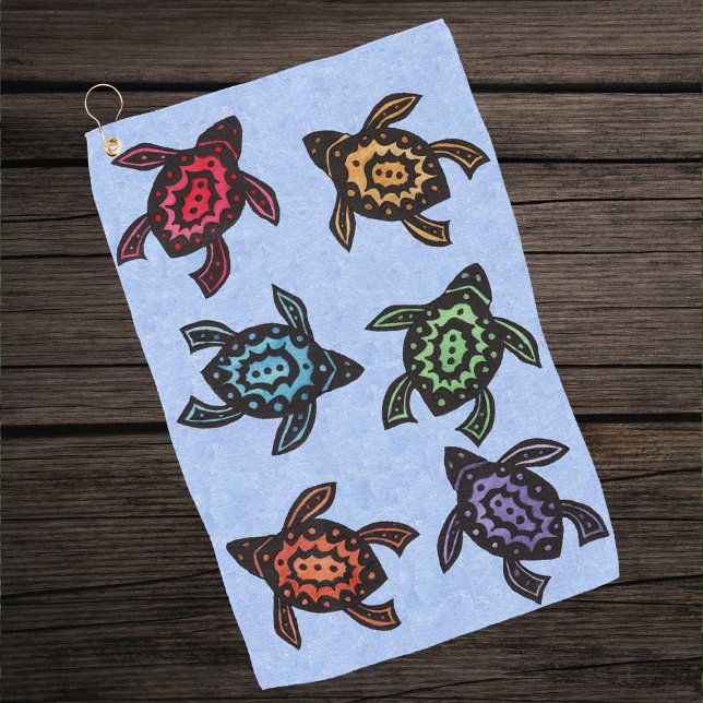 Gruppe der Abstrakten Schwarzen Schildkröten farbe Golfhandtuch (Bunch of abstract turtles with different color shells on light blue golf towel.)