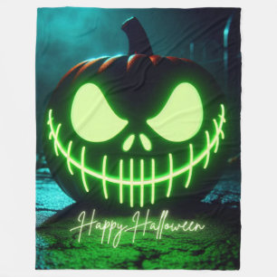 Gruseliger grün leuchtender Halloween-Kürbis Fleecedecke
