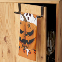 Gruseliger Halloween-Kürbis mit Geist und Spinnen-