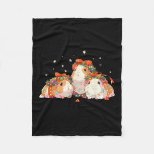 Guinea Schweine in der Guinea Weihnachtslicht vers Fleecedecke