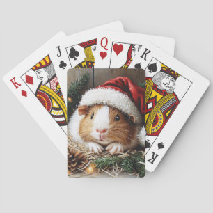 Guinea Schweinefleisch Weihnachtsmannmütze tragen Spielkarten
