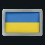 Gürtelschnalle mit der Flagge der Ukraine<br><div class="desc">Fügen Sie Ihrem Kleiderschrank eine Touch ukrainischen Stolzes mit unserem exklusiven Gürtelschnalle mit der Flagge der Ukraine hinzu! Dieser Gürtelschnalle, der mit viel Liebe zum Detail gestaltet wurde, ist mehr als nur ein funktionales Accessoire; er ist eine Feier des ukrainischen Erbes und des kulturellen Stolzes. Das lebendige Design zeigt deutlich...</div>