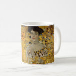 Gustav Klimt - Adele Bloch-Bauer I Kaffeetasse<br><div class="desc">Adele Bloch-Bauer I. von Gustav Klimt. Schönes Gemälde einer schönen Frau mit einem schönen Lächeln. In goldenen Farben gestrichen mit künstlerischen Werten des Jugendstils. Erhältlich auf vielen verschiedenen Geschenkideen und wunderbaren Produkten für Kunstliebhaber. Karo in unserem Shop für verwandte Produkte mit diesem Kunstwerk und entdecken auch andere großartige Gemälde von...</div>