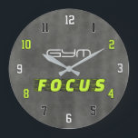 GYM FOCUS Modern Fitness Große Wanduhr<br><div class="desc">This modern GYM FOCUS wall clock is designed for fitness lovers and gym spaces. The minimalist gray background combined with bold neon green typography creates a powerful and energetic look that fits perfectly in gyms, workout rooms, fitness studios, or home gyms. The numbers are styled in a dynamic mix of...</div>