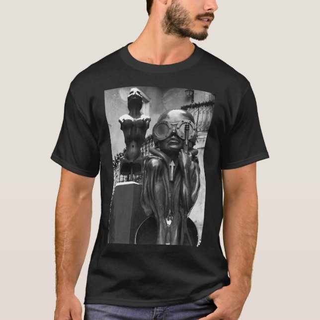 H R Giger Museum Baby Bullet Statue. Gruyeres T-Shirt (Vorderseite)