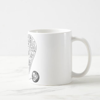 Häkelarbeit fasst Tasse ab