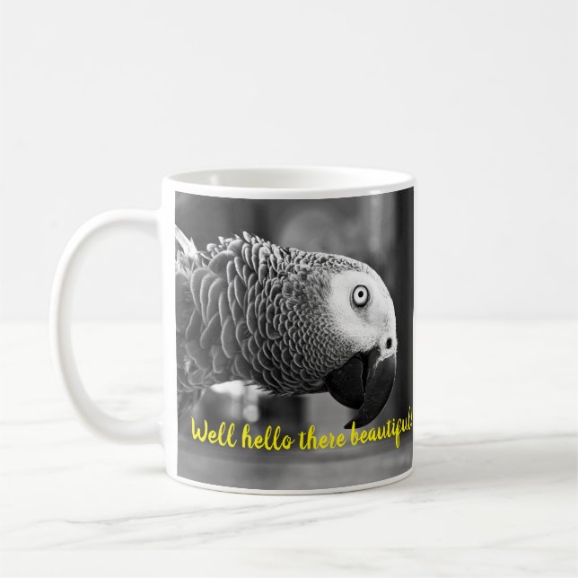 Hallo schön - Ein grauer Papagei. Kaffeetasse (Links)