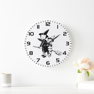 Halloween-Hexe und Clown auf einem Besenstiel Große Wanduhr