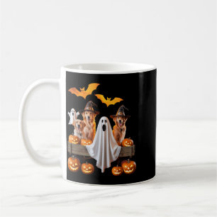 Halloween-Hunde mit Kürbissen und Fledermäusen als Kaffeetasse