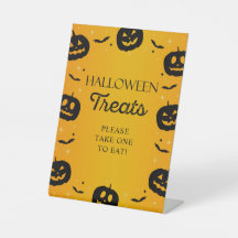 Halloween-Leckereien nehmen einen zum Essen von Kü