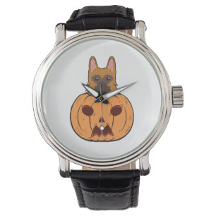 Halloween-Niedliche deutsche Hirten stecken in ein Armbanduhr