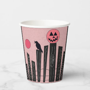 Halloween-Szene mit rosa Papiertassen Pappbecher