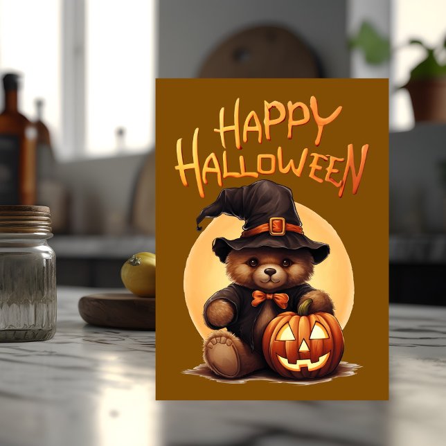 Halloween Teddy Bar Karte (Halloween card with teddy bear on the front sits on top of a kitchen counter.)