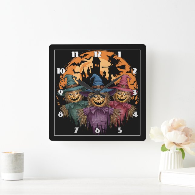 Halloween-Trio unter einem spöttischen Mondlicht Quadratische Wanduhr (Zuhause)