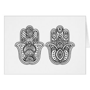 Hamsa tiré par la main avec des ornements
