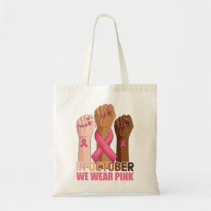 Hand im Oktober tragen wir rosa Brustkrebs-Bewusst Tragetasche