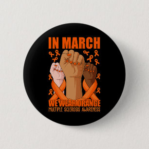 Hand in März tragen wir Orangen-MS-Multipler Skler Button