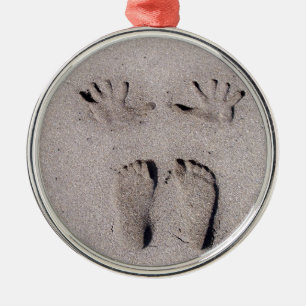 Hand und Füße druckt im Florida-Strandsand Ornament Aus Metall