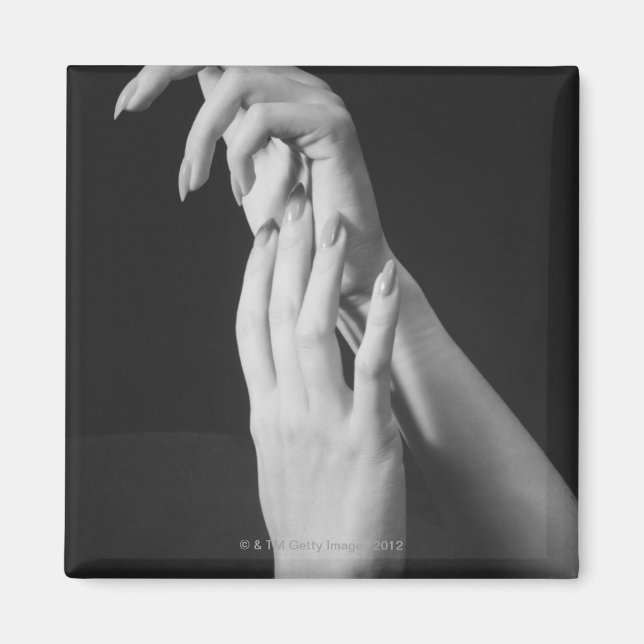 Hände der Frau Magnet (Vorne)