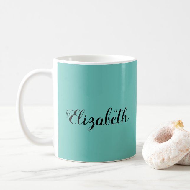 Handgeschriebener Name der Tasse des Kaffees Leuch (Mit Donut)