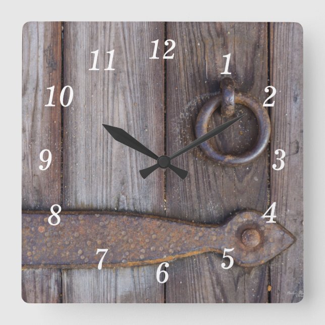 Handle an der Wand Quadratische Wanduhr (Vorderseite)