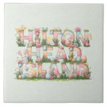 Happy Easter from Hilton Head Island Fliese<br><div class="desc">Happy Easter Hilton Head Style! The design on this colorful ceramic tile features a whimsical and festive depiction of the text "Hilton Head Island" with each letter beautifully decorated for Easter! Included are pastel-colored Easter eggs, blooming spring flowers, soft ribbons, and playful bunny motifs. The tile/trivet is perfect for Easter...</div>