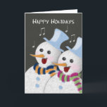 Happy Holidays Jolly Singing Snowmen Couple Feiertagskarte<br><div class="desc">Eine niedliche Weihnachtskarte mit Chalkboard-Themen,  die ein fröhliches festliches Snowmannpaar mit bunten Wollschals und Singen von Urlaubssliedern enthält. Eine sehr fröhliche und glückliche Karte für den Urlaub. Vorderer Text: Gute Ferien. ©PamJArts</div>