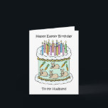 Happy Oaster Birthday to Husband Karte<br><div class="desc">Eine Illustration eines weißen Geburtstagskuchens,  der mit Kerzen geschmückt ist,  und Bildern von Brüsten und Karotten an den Seiten. Die Worte 'Happy Oaster Birthday to my Husband' begleiten das Bild,  das einen knackigen weißen Hintergrund hat.</div>