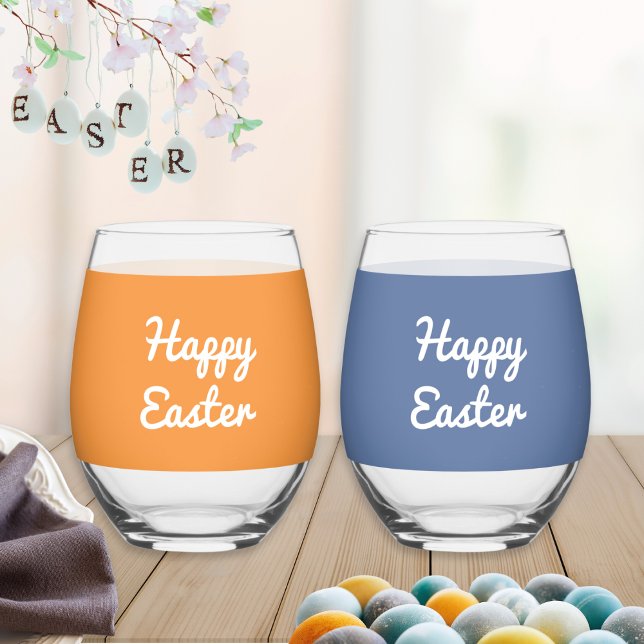 Happy Oaster Custom Set of 2 Stemless Wine Glasses Weinglas Ohne Stiel (A pair of stemless wine glasses, one orange, one blue. Happy Easter on front, add names on the back)