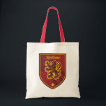 Harry Potter | Gryffindor House Pride Wappen Tragetasche<br><div class="desc">Achtung, alle stolzen Gryffindors! Dieses grafische Design, das den tapferen Gryffindor-Löwen darstellt, bietet die perfekte Gelegenheit, Ihre Unterstützung für Hogwarts Lieblingshaus zu zeigen! Als Vertreter einiger der berühmtesten Zauberer der Welt wie Harry Potter und Albus Dumbledore beherbergt Gryffindor nur die tapfersten Zauberer und Hexen! Dieser coole Stilstil hat ein Vintages...</div>