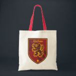 Harry Potter | Gryffindor House Pride Wappen Tragetasche<br><div class="desc">Achtung, alle stolzen Gryffindors! Dieses grafische Design, das den tapferen Gryffindor-Löwen darstellt, bietet die perfekte Gelegenheit, Ihre Unterstützung für Hogwarts Lieblingshaus zu zeigen! Als Vertreter einiger der berühmtesten Zauberer der Welt wie Harry Potter und Albus Dumbledore beherbergt Gryffindor nur die tapfersten Zauberer und Hexen! Dieser coole Stilstil hat ein Vintages...</div>