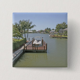 Häuser und Stege am Kanal Marco Island Florida Button